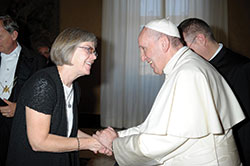 Benedictine Sister Jennifer Mechtild Horner, prioress of Our Lady of Grace Monastery in Beech Grove, greets Pope Francis during an international meeting of Benedictine sisters in Rome in September. (Submitted photo)