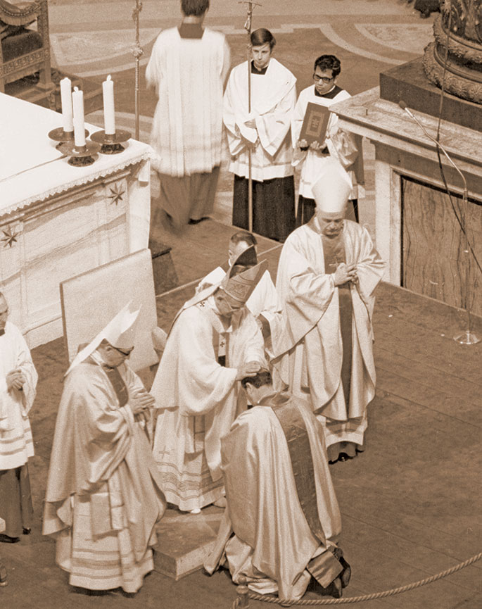 In this photo, Archbishop Edward T. O’Meara, former archbishop of Indianapolis, is ordained a bishop on Feb. 13, 1972, by St. Paul VI at St. Peter’s Basilica at the Vatican. Pope Paul appointed Archbishop O’Meara an auxiliary bishop of the Archdiocese of St. Louis on Jan. 28, 1972. He had been ordained a priest of that archdiocese in 1946 by Archbishop Joseph E. Ritter, who previously served as the first archbishop of Indianapolis. St. John Paul II appointed Archbishop O’Meara as the fourth archbishop of Indianapolis on Nov. 21, 1979. He served as the shepherd of the Church in central and southern Indiana until his death on Jan. 10, 1992.
