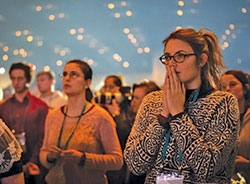 Kalyann Palacios, a student at the University of Texas in Austin, prays before the Blessed Sacrament during adoration on Jan. 5 at the SEEK2019 conference in the Indiana Convention Center in Indianapolis. Sponsored by the Denver-based Fellowship of Catholic University Students, the Jan. 3-7 event drew about 17,000 people, mostly college students. (Photo by Katie Rutter)