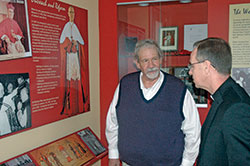 When Archbishop Charles C. Thompson came to the childhood home of Cardinal Joseph E. Ritter in New Albany on March 14, he received a personal tour from David Hock, chairman of the Cardinal Ritter Birthplace Foundation. (Photo by John Shaughnessy)