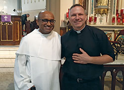 Dominican Father Leon Pereira, chaplain to the English-speaking pilgrims at Medjugorje poses on March 7 with Father Rick Nagel, pastor of St. John the Evangelist Parish in Indianapolis. (Submitted photo by Jennifer Lindberg)