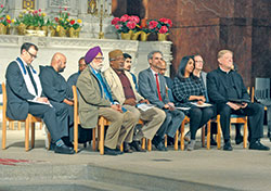 Leaders from a variety of faith communities sit in the sanctuary of SS. Peter and Paul Cathedral in Indianapolis for an April 25 “Solidarity Vigil and Interfaith Prayer” in response to the Easter Sunday bombings in Sri Lanka. (Photo by Sean Gallagher)