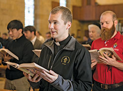 Transitional Deacon Vincent Gillmore prays with fellow seminarians on April 20, 2018, in the St. Thomas Aquinas Chapel at Saint Meinrad Seminary and School of Theology in St. Meinrad. Deacon Gillmore will be ordained a priest at 10 a.m. on June 1 in SS. Peter and Paul Cathedral in Indianapolis. The liturgy is open to the public. (Photo courtesy of Saint Meinrad Archabbey)