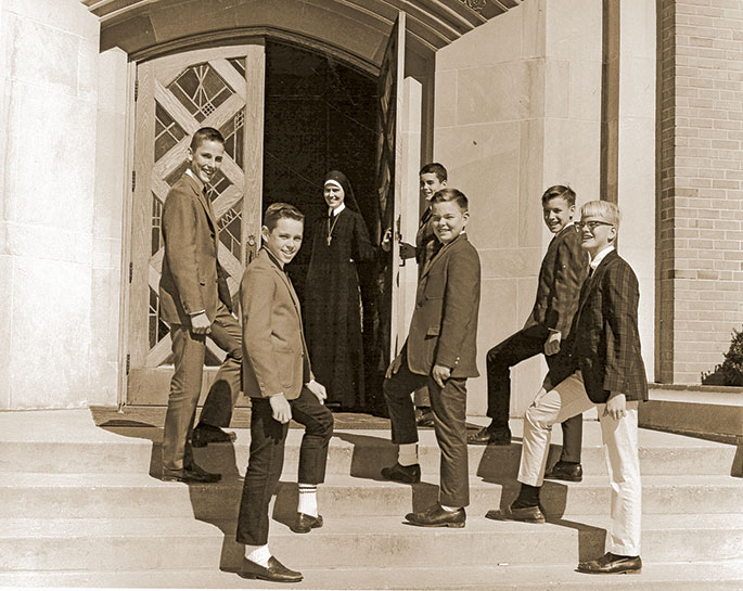 In this photo, Franciscan Sister Ramona Lunsford, a teacher at St. Michael the Archangel School in Indianapolis, is shown with students who would appear with her on an episode of “Sister Says,” a local Catholic television program that aired on WISH during the 1960s. The episode was part of a series titled, “A Tour Through the Roman Catholic Church.” The students were all part of a boys’ choir that performed during the episode. From left to right, the boys are: Jay Koffskey, Mark Haag, Duane Fricke, Mike Fleetwood, Pat Hennessy and Chris Crockett. This photo originally appeared in The Criterion on Oct. 29, 1965.