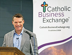 Indianapolis Colts’ general manager Chris Ballard shares the story of “the greatest feeling” in his life with the audience of the Catholic Business Exchange in Indianapolis on May 17. (Photo Credit: Denis Ryan Kelly Jr.)