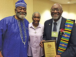 Holy Cross Brother Roy Smith, right, smiles after he received an award for his commitment to community service—an award that was presented to him on July 24 in Baltimore during the annual joint conference of the National Black Catholic Clergy Caucus, the National Black Sisters’ Conference, the National Black Catholic Seminarians Association and the National Association of Black Catholic Deacons. He was joined during the awards ceremony by some of his siblings including Joseph Smith and Sister Demetria Smith, a Missionary Sister of Our Lady of Africa. (Submitted photo)