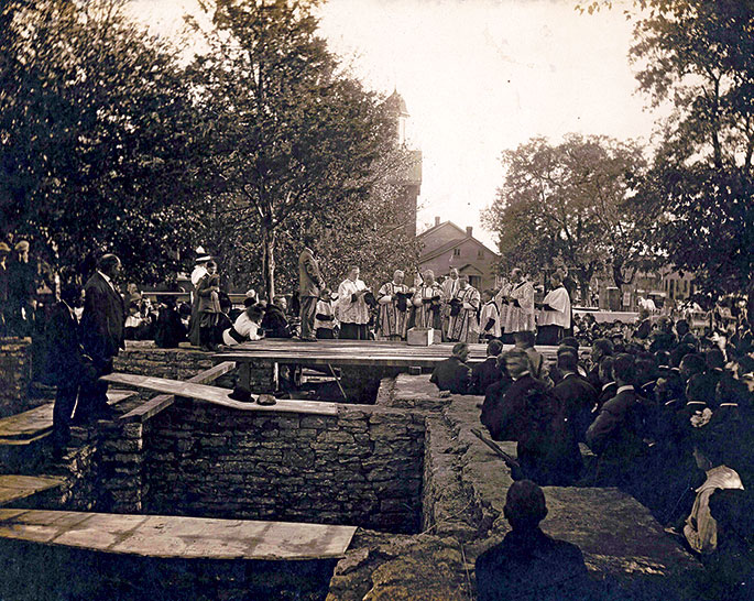 A cornerstone is laid for the new St. Martin Church in Yorkville in this photo from 1914. The parish school (now closed), with its bell tower, can be seen in the background. The former St. Martin Parish was founded in 1850 and is now part of All Saints Parish in Dearborn County. The church, which was constructed more than a century ago, is still in use.