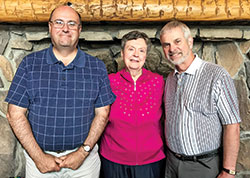 Deacon John Jacobi, left, Ann Northam and Tom Yost pose for a photo during a luncheon to celebrate the retirement of Northam, who stepped down this summer after serving for 35 years as director of religious education at Most Sacred Heart of Jesus Parish in Jeffersonville. All three are veteran catechetical leaders in the New Albany Deanery who have mentored lay Catholics entering into the ministry in the deanery. (Submitted photo)