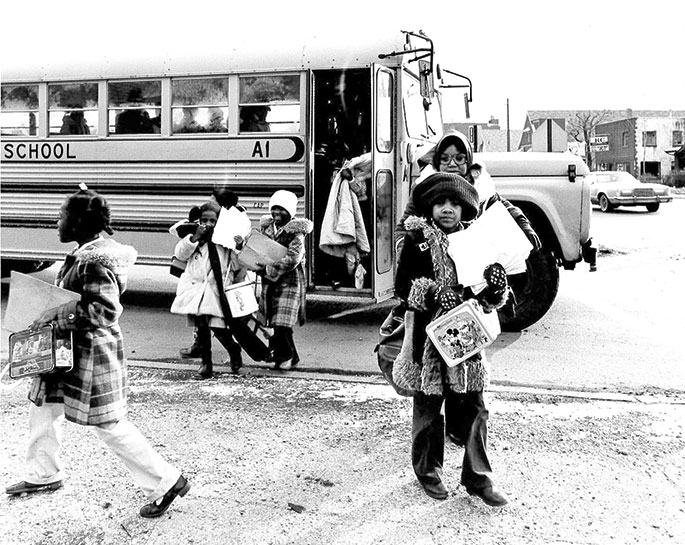 Children exit a school bus at Holy Angels School in Indianapolis in this photo from the 1970s. Holy Angels Parish was founded in 1903. In 1999, the parish opened the first new school building for a center-city Catholic parish in the United States in 