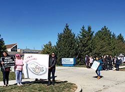 Members of St. Gabriel the Archangel Parish in Indianapolis promote respect for life outside the Planned Parenthood abortion facility in Indianapolis as part of an America Needs Fatima rosary rally of prayer for the conversion of hearts on Oct. 12. The rally fell within the timeframe of the 40 Days for Life fall prayer campaign taking place outside the same facility, the state’s largest abortion provider. (Submitted photo by Tim O’Donnell)