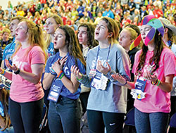 Youths from the Diocese of Des Moines, Iowa, worship in song during a session at the National Catholic Youth Conference at the Indiana Convention Center in Indianapolis on Nov. 22. (Photo by Natalie Hoefer)