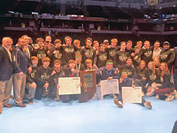 The Cathedral High School wrestling team displays its hardware after winning its third straight team championship in the Indiana High School Athletic Association’s Wrestling State Finals at Bankers Life Fieldhouse in Indianapolis on Feb. 22. (Submitted photo)