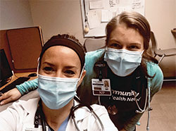 Nurse practitioners Katie Kennedy, left, and Gina Catanese are two of the dedicated health care workers who are taking care of COVID-19 patients at Community Hospital East in Indianapolis. (Submitted photo)