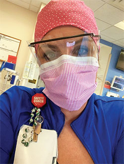 Catie Walden wears her protective equipment as she cares for children as a charge nurse in the pediatric emergency department at Ascension St. Vincent Hospital in Indianapolis. (Submitted photo) 