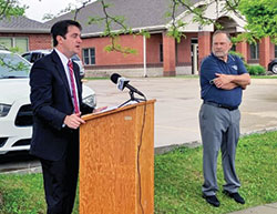 Marc Tuttle, left, director of Indianapolis Right to Life, introduces Tippecanoe County Right to Life board member Kevin Niebrugge, right, at a press conference held by the northern Indiana pro-life organization in front of the Planned Parenthood abortion facility in Lafayette, Ind., on May 19. (Submitted photo by Jodi Smith)