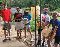 Youths volunteer for Holy Family Parish’s St. Vincent de Paul conference in New Albany on Aug. 12. (Submitted photo)