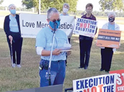 During a press conference near the Federal Correctional Complex in Terre Haute on Sept. 24, Providence Sister Barbara Battista reads a letter written by William LeCroy, a federal death-row inmate who was executed at the complex on Sept. 22. (Screenshot from livestream at www.facebook.com/pg/sistersofprovidence)