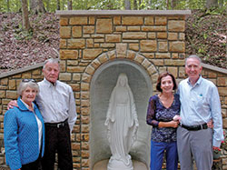 When a new grotto for the Blessed Mother was dedicated at Camp Rancho Framasa on Sept. 22 in honor of the life of Ryan Condon, his parents, Trish, left, and Derry Condon, and his aunt and uncle, Billie and Dr. David Bankoff, posed for a photo on the grounds of the Catholic Youth Organization camp in the archdiocese. (Photo by John Shaughnessy)