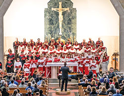 Joseph Chrisman, pastoral associate for music and faith formation at Holy Name of Jesus Parish in Beech Grove, conducts Holy Name’s annual Christmas concert in 2019. (Submitted photo by Robert Parsons)