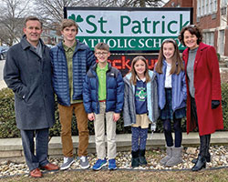 The connection of the Shagley family to St. Patrick School in Terre Haute runs deep, influencing the lives of parents Richard and Alice and their four children. Here, the family members come together for a photo on the school grounds: Pictured are, Richard, left, George, William, Harriet, Eleanor and Alice Shagley. (Submitted photo)