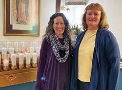 St. Ambrose Parish wedding co-coordinators Renee Hodge, left, and Jamie Armes pose for a wedding ministry photo in the church of their Seymour faith community. (Submitted photo by Katie Hodge)