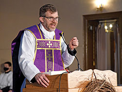 Father Jonathan Meyer, pastor of All Saints Parish in Dearborn County, preaches a homily on Feb. 27 in the St. Joseph campus church of the Batesville Deanery faith community during the sixth annual E6 Catholic Men’s Conference. (Photo by Sean Gallagher)