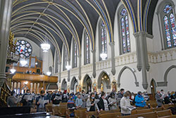 Catholics from central and southern Indiana wear masks in St. John the Evangelist Church in Indianapolis on Jan. 22 during the Mass solemnly recalling the U.S. Supreme Court’s Jan. 22, 1973, Roe v. Wade decision legalizing abortion. Those worshipping at the Mass signed up in advance for tickets, since seating was limited to help stop the spread of the coronavirus. (File photo by Natalie Hoefer)