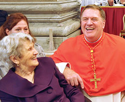 Cardinal Joseph W. Tobin spends time with his mother Marie on Nov. 19, 2016, the day he was installed into the College of Cardinals, in St. Peter’s Basilica at the Vatican. (File photo by John Shaughnessy)