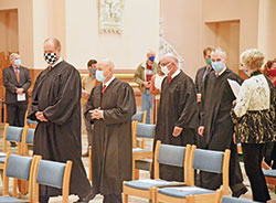 Judges process into SS. Peter and Paul Cathedral in Indianapolis on Oct. 7, 2020, at the beginning of the annual Red Mass of the St. Thomas More Society of Central Indiana. (File photo by Sean Gallagher)