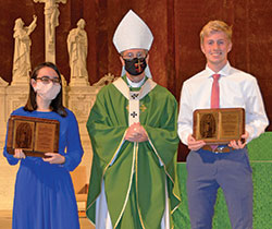 From left, Maria Thomas, Archbishop Charles C. Thompson and Erik Eigenbrod