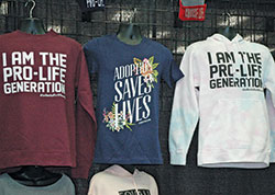 Youths used messages on T-shirts and sweatshirts to show their Catholic faith, including their support for pro-life concerns. (Photo by John Shaughnessy)