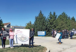 Members of St. Gabriel the Archangel Parish in Indianapolis promote respect for life outside the Planned Parenthood abortion facility in Indianapolis on Oct. 12, 2019. (Criterion file photo)