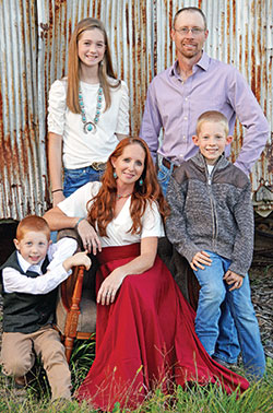 Jamie and Tom Schilmiller pose with their children Lee, left, Lacy and Evan. (Submitted photo)