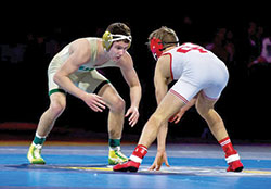 Zeke Seltzer, left, of Cathedral High School in Indianapolis, earned a state championship in wrestling for the third straight year on Feb. 19. (Submitted photo)