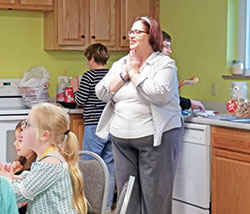 A look of joy has been a common feature of Theresa Shaw as she has shared her love of God with children and adults in Holy Family Parish in New Albany. (Submitted photo)