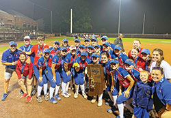 The members of the softball team of Roncalli High School in Indianapolis celebrate their state championship on June 11, after beating the team from Harrison High School, 16-0. (Submitted photo)