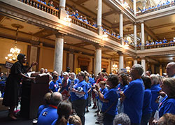 Angela Minter, founder and president of the Louisville, Ky.-based Sisters for Life pro-life ministry, speaks on July 26 at the Indiana Statehouse in Indianapolis to approximately 1,200 people attending a “Love Them Both” rally sponsored by Indiana Right to Life. The rally took place while an Indiana Senate committee was preparing to vote on a bill that would ban most abortions in the state. (Photo by Sean Gallagher)