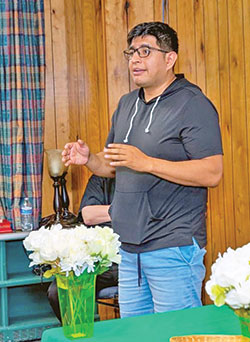 Saul Llasca, archdiocesan coordinator of Hispanic Ministry, addresses participants at the Iskali retreat on Aug. 28 at the Benedict Inn Retreat and Conference Center in Beech Grove. (Photo by Natalie Hoefer)