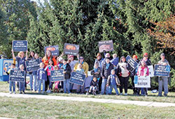 Members of a new group called Homeschoolers 4 Life pose in front of the Planned Parenthood abortion center in Indianapolis during a prayer vigil on Oct. 19. It was the first official event of the group.