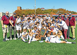 The boys’ soccer team of Brebeuf Jesuit Preparatory School in Indianapolis celebrates winning the Class 2A state championship of the Indiana High School Athletic Association on Oct. 29 in Michael A. Carroll Track and Soccer Stadium in Indianapolis. (Photo courtesy of MJH/DoubleEdge Media)
