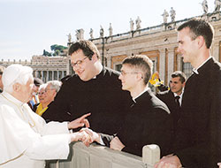 Pope Benedict XVI greets then deacon candidates Sean Danda, center, from St. Malachy Parish in Brownsburg, Nicholas Vaskov, left, of the Diocese of Pittsburgh, and Jesse Burish, right, of the Diocese of LaCrosse, Wis., in St. Peter’s Square in Rome in 2008. The seminarians received priestly formation at the Pontifical North American College in Rome. (Submitted photo/L’Osservatore Romano)