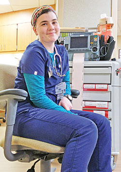 Maggie Westjohn takes a break from her work as a nurse at Reid Memorial Hospital in Richmond. She views her career choice as a reflection of all the guidance and support she received during her education in the Seton Catholic Schools in Richmond. (Submitted photo)