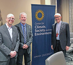 John Mundell, center, a member of Our Lady of Lourdes Parish in Indianapolis, poses with Brian Henning, left, and Cardinal Michael F. Czerny in a recent event at Gonzaga University in Spokane, Wash., to help launch “Our Common Home: A Guide to Caring for Our Living Planet.” Mundell is the director of the Laudato Si’ Action Platform, a part of the Vatican’s Dicastery for Integral Human Development, which is led by Cardinal Czerny. Henning is a professor of philosophy and environmental studies at Gonzaga. (Submitted photo)