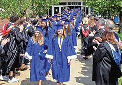 Members of the Class of 2022 of Bishop Chatard High School in Indianapolis show their joy as they process from their graduation ceremony in May of 2022. (Submitted photo)