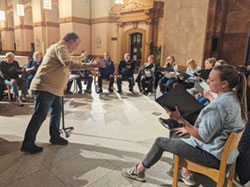 Andrew Motyka conducts Vox Sacra in rehearsal at SS. Peter and Paul Cathedral in Indianapolis in preparation for its upcoming concert on Dec. 16 at St. Luke the Evangelist Church in Indianapolis. (Photo by Ann Margaret Lewis)