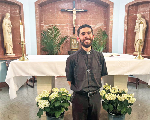 Holy Cross Father Geoffrey Mooney often spends time in the chapel at Cathedral High School in Indianapolis, where he is a math teacher. (Photo courtesy of Tyler McClure)