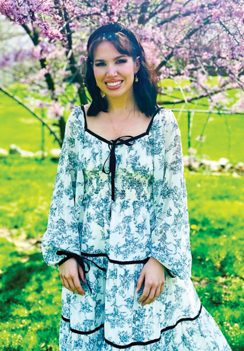 Hannah Carroll smiles on Easter, the day after she was welcomed into the full communion of the Church at SS. Peter and Paul Cathedral in Indianapolis. (Submitted photo)