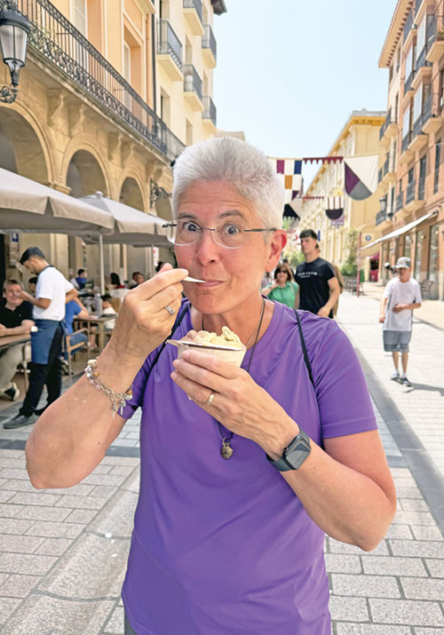 Benedictine Sister Nicolette Etienne of Our Lady of Grace Monastery in Beech Grove enjoys a dish of ice cream, one of her joys during the challenging and uplifting journey on the Camino. (Submitted photo)
