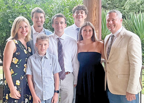 The members of the McNeany family&mdash;Jennifer, left, Noah, Colin, Evan, Adam, Mary and James&mdash;know the benefits of a Catholic education. (Submitted photo)