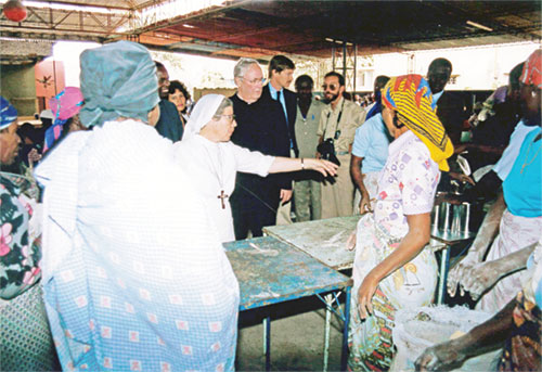 In this photo from 1990, Archbishop Edward T. O&rsquo;Meara of Indianapolis visited the African nation of Angola. The visit was on behalf of a national Catholic organization that Archbishop O&rsquo;Meara chaired at that time.